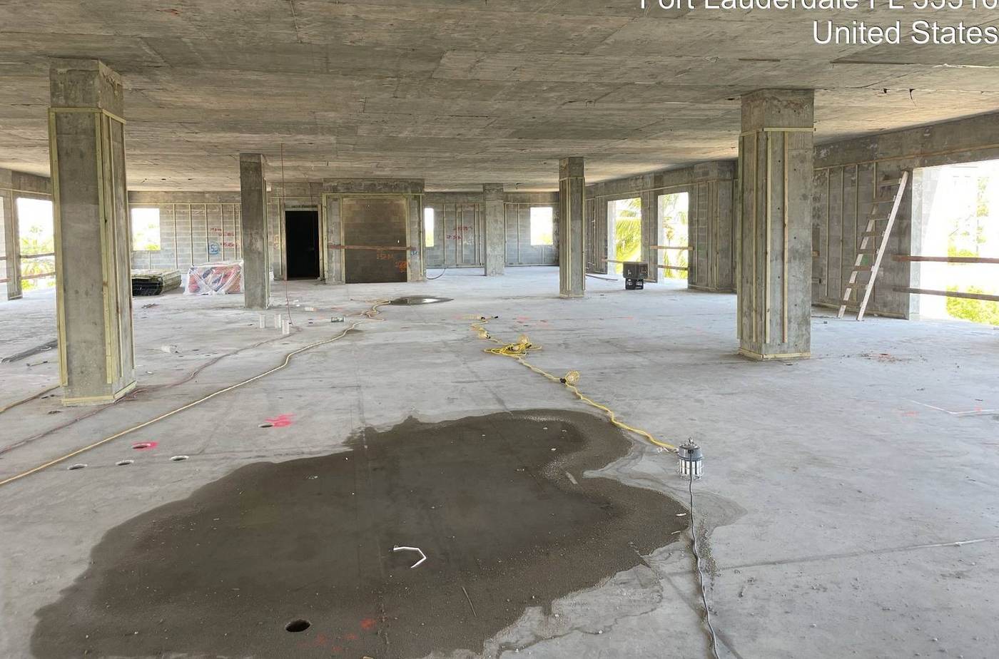 Open concrete floor plate inside a structural shell project